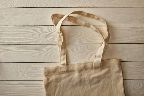 istock top view of empty cotton bag on white wooden surface, zero waste concept 1144812210