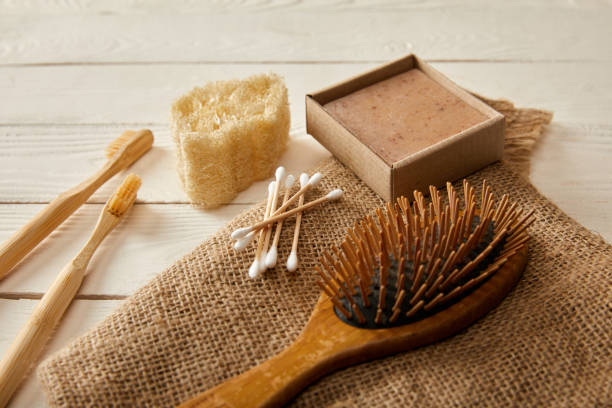 istock different hygiene and care items on sackcloth on white wooden surface, zero waste concept 1144812264