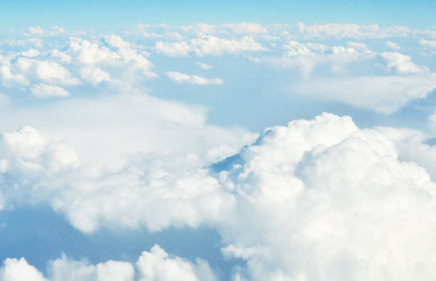 istock White clouds and blue sky view from airplane window. 1144813911