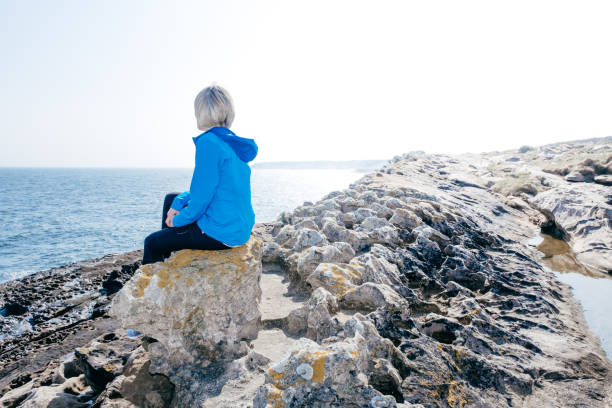 istock Looking out to sea, searching for something 1144814165