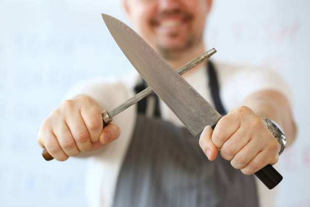 istock Professional Kitchen Knife Sharpening Photography 1144814362