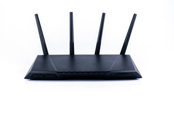 istock Black router or access point isolated on white background. 1144815156