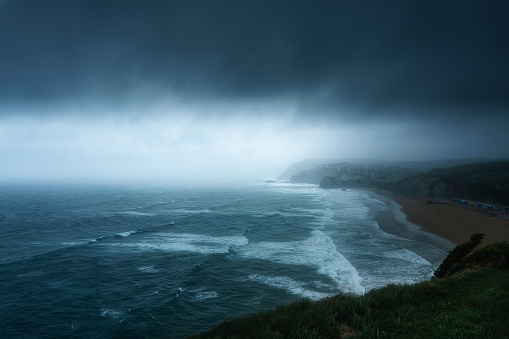 storm with dark clouds over the sea in Sopelana