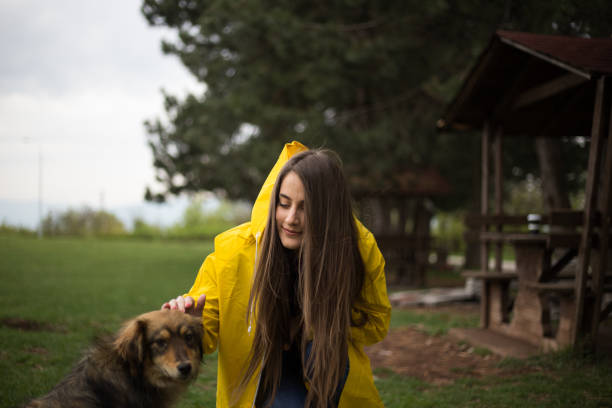 istock Playing with dog on rainy day 1144817608