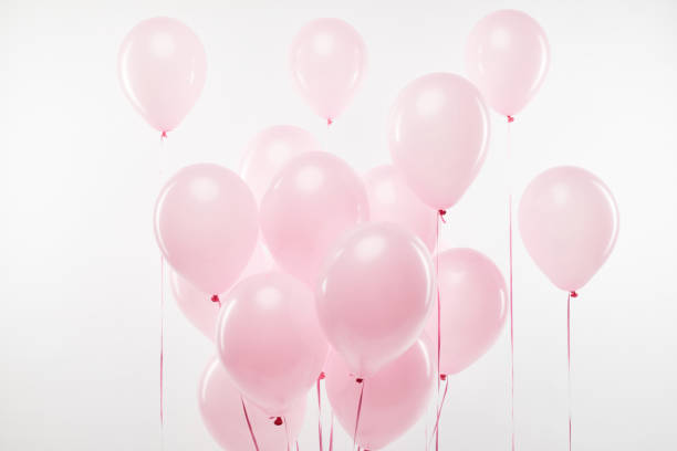 istock background with bundle of decorative pink air balloons on white 1144820206