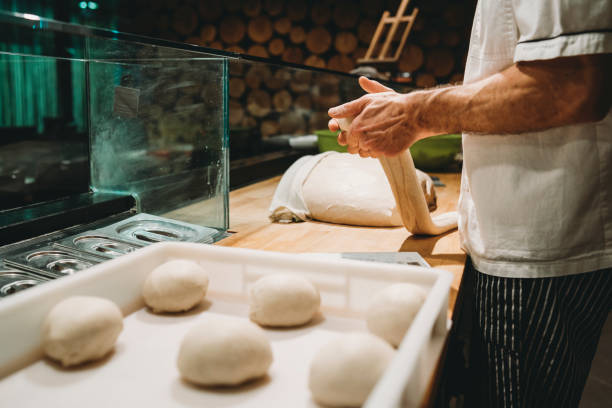 istock Pizza chef preparing the pizza dough at the restaurant 1144820681