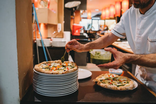 istock Pizza chef preparing pizza at the restaurant 1144820812