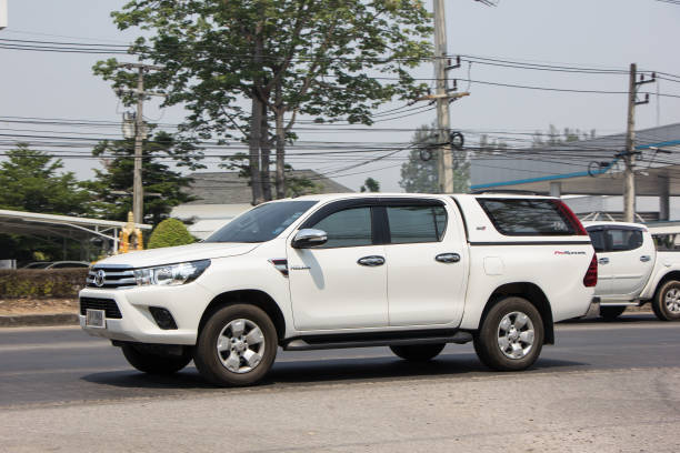 Private Pickup Truck Car Toyota Hilux Revo Chiangmai, Thailand - April 9 2019: Private Pickup Truck Car Toyota Hilux Revo. On road no.1001, 8 km from Chiangmai city. toyota hilux stock pictures, royalty-free photos & images