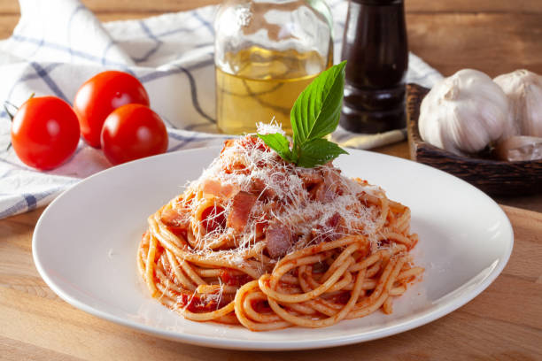 istock Spaghetti in a dish on a wooden background 1144823598