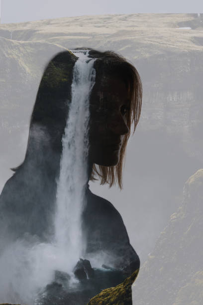 istock Double exposure of pensive woman and waterfall 1144824510