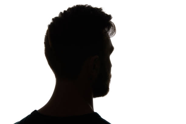 istock Silhouette of man looking away isolated on white 1144824531