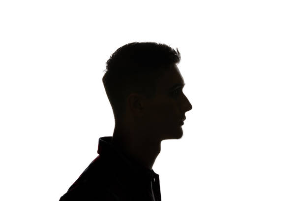 istock Silhouette of man looking away isolated on white 1144824537