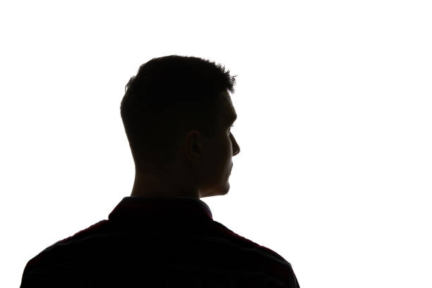 istock Silhouette of man looking away isolated on white 1144824538