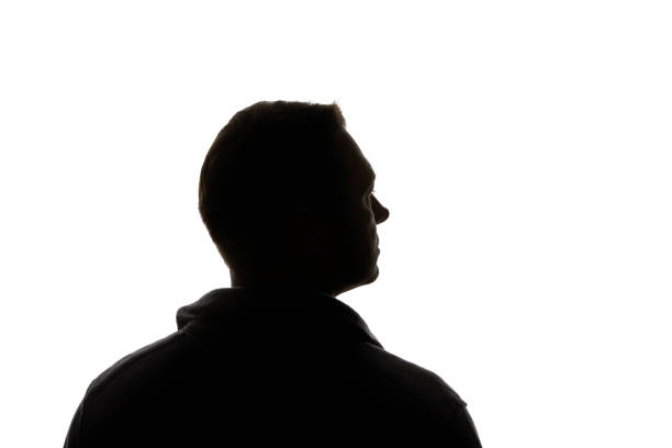 istock Silhouette of man looking away isolated on white 1144824602