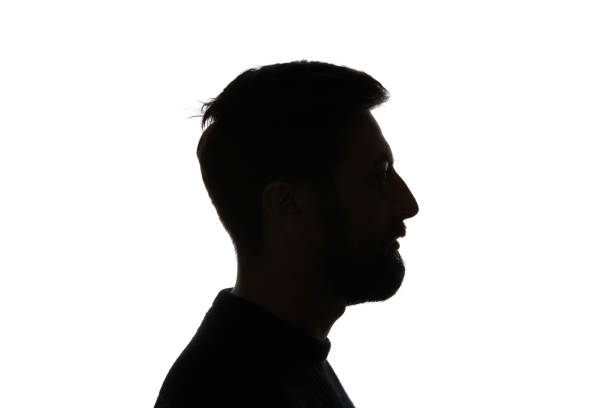 istock Side view of man looking away isolated on white 1144824620