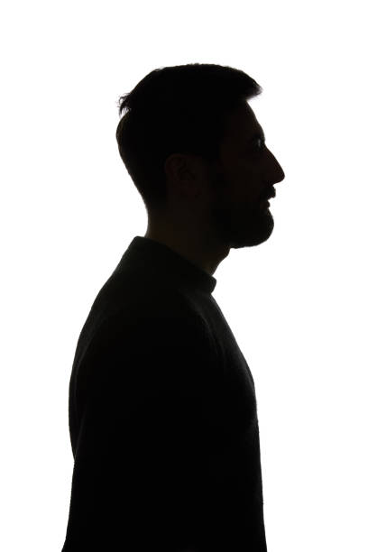 istock Side view of man looking away isolated on white 1144824629