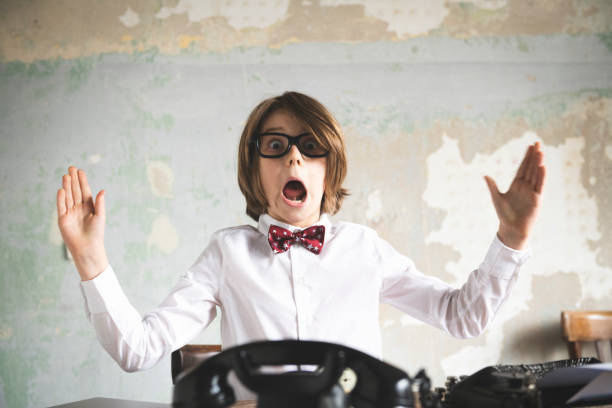 istock Young Boy Businessman Is suprised at the Office 1144824790