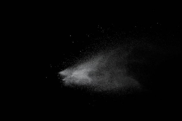 istock White powder explosion isolated on black background. White dust particles splash.Color Holi Festival. 1144824822