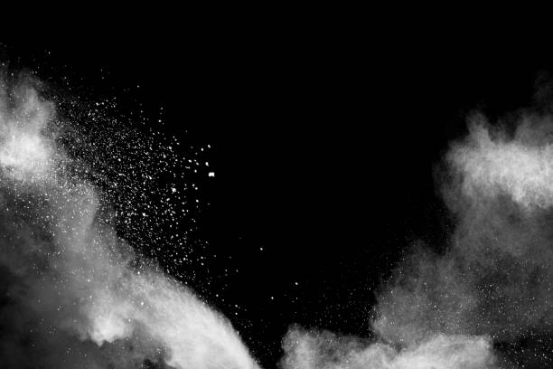 istock White powder explosion isolated on black background. White dust particles splash.Color Holi Festival. 1144824825