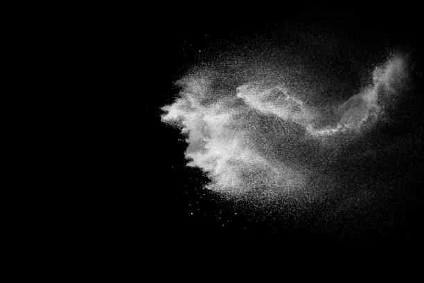 istock White powder explosion isolated on black background. White dust particles splash.Color Holi Festival. 1144824857