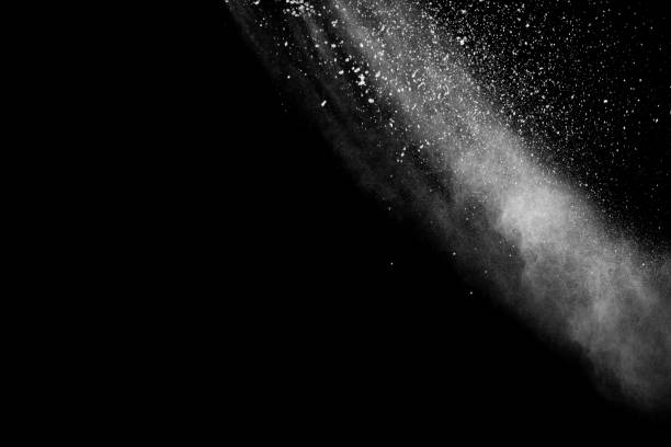 istock White powder explosion isolated on black background. White dust particles splash.Color Holi Festival. 1144824866