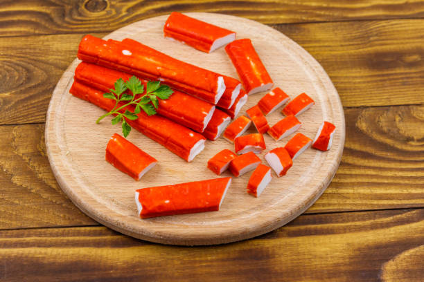 istock Crab sticks on cutting board on wooden table 1144825395
