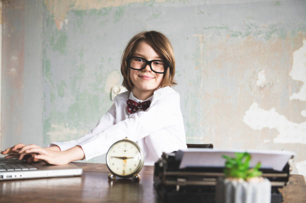 istock Young Boy Businessman at Office 1144826321