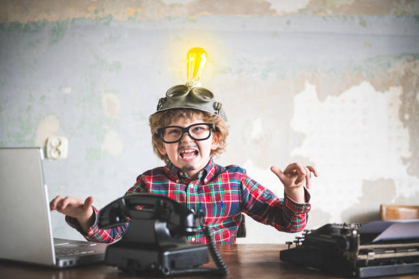 istock Young Boy Businessman Is busy at the Office 1144829148