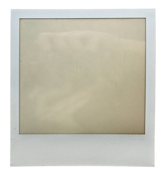 istock single empty or blank instant film frame or photo placeholder on real background 1144829451