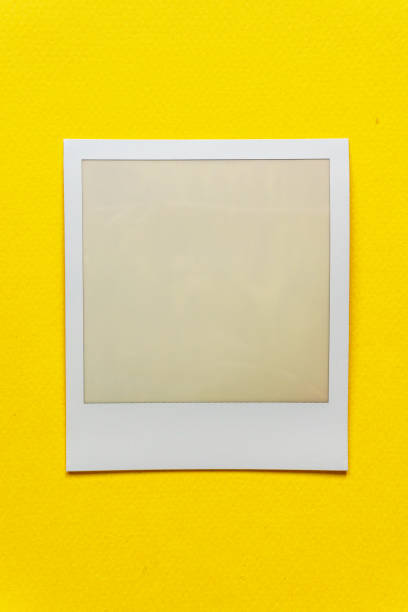 istock single empty or blank instant film frame or photo placeholder on real background 1144829456