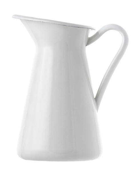 White enamel antique jug Isolated objects: white enamel antique jug on white background jar of milk stock pictures, royalty-free photos & images