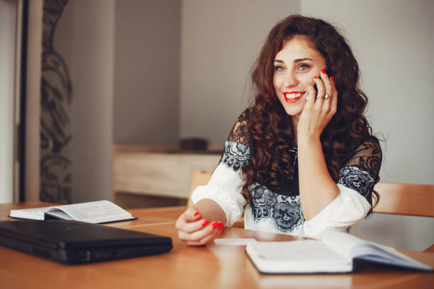 istock Beautiful girl works in the office 1144832933