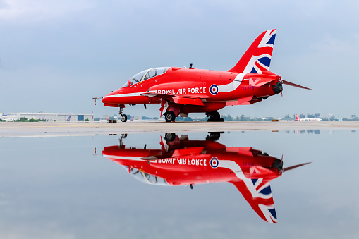 British Aerospace Hawk T Mark I of the Royal Air Force Red Arrows aerobatic team at Donmeuang International Airport (DMK/VTBD), right after a rain storm on 9 November 2016.