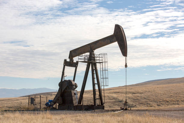 istock View of Pumpjack (Horsehead) at Daylight Oil Industry 1144835239