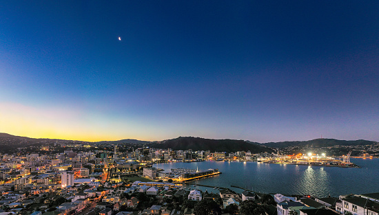 A high angle view of New Zealand's capital city, Wellington at dusk. The city is located at the south of the country's North Island.