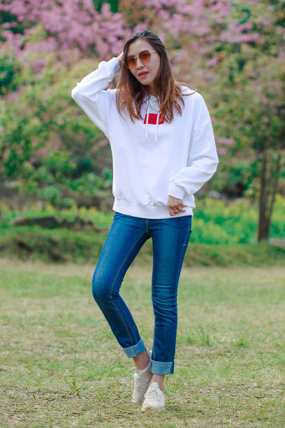 istock Woman standing on the lawn 1144837529