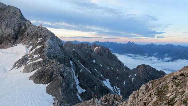 istock early morning view from mountain top with rock formations and cloud cover 1144840212