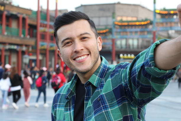 istock Man taking a selfie in Asia 1144840479