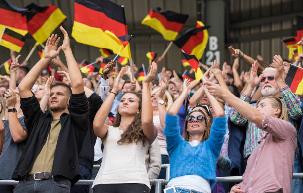 Germany Supporters Waving Their Flags On A Stadium