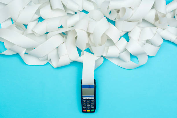 istock POS terminal with very long receipt 1144844344