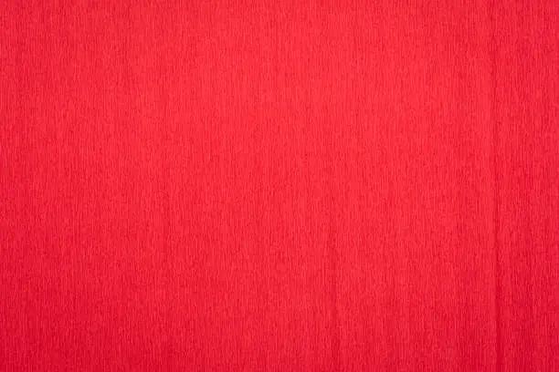red crepe paper - background with crinkled texture