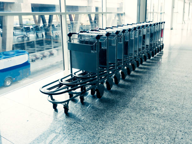 istock Airport luggage carts 1144852423