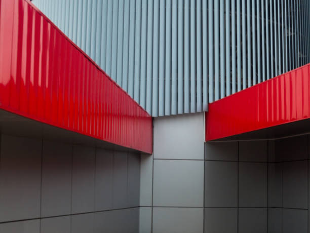 istock Modern building. Gray and red metal walls. 1144854652
