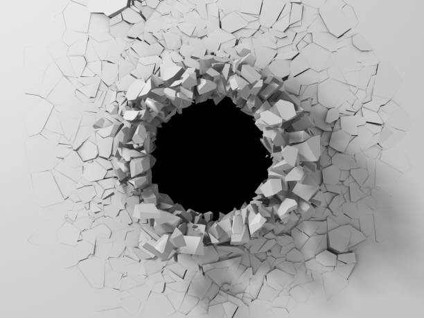 istock Dark destruction cracked hole in white stone wall 1144857714
