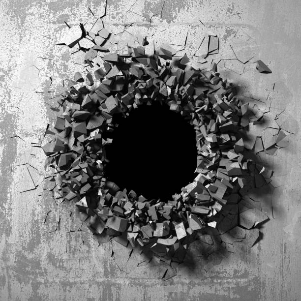 istock Dark cracked broken hole in concrete wall 1144858160