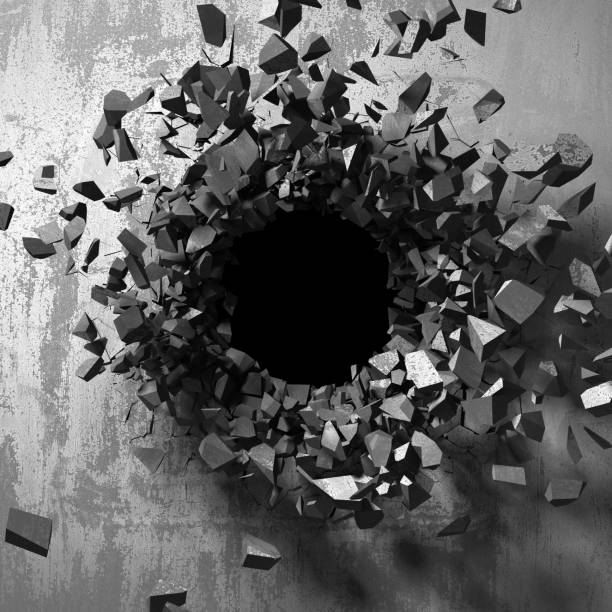 istock Dark cracked broken hole in concrete wall 1144858229
