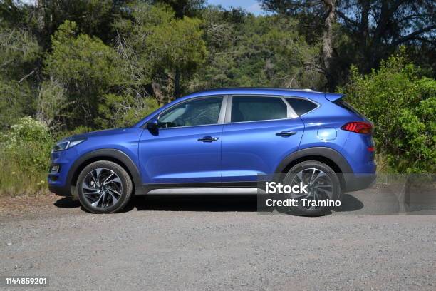 Blue Hyundai Tucson Suv Vehicle On The Road Stock Photo - Download Now - Car, Mountain, Side View - iStock