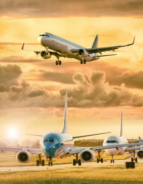 istock Airplane landing others standing on airfield waiting for take off 1144860411