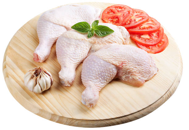 istock Raw chicken meat on dish on white background 1144860624