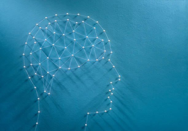 Brain synapses concept Mind concept. Network of pins and threads in the shape of a brain inside a human head symbolising consciousness. psyche photography stock pictures, royalty-free photos & images